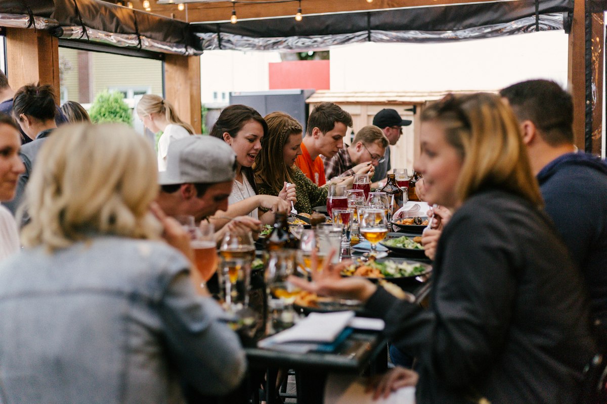 Team sharing lunch around a table